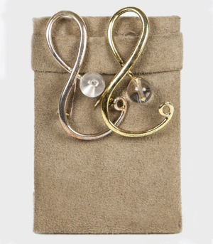 Silver or gold platted brooch with cristal de roche