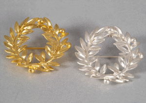 Silver or gold platted classic brooch
