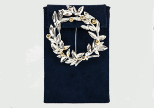 Silver or gold platted large brooch with with gold plated details